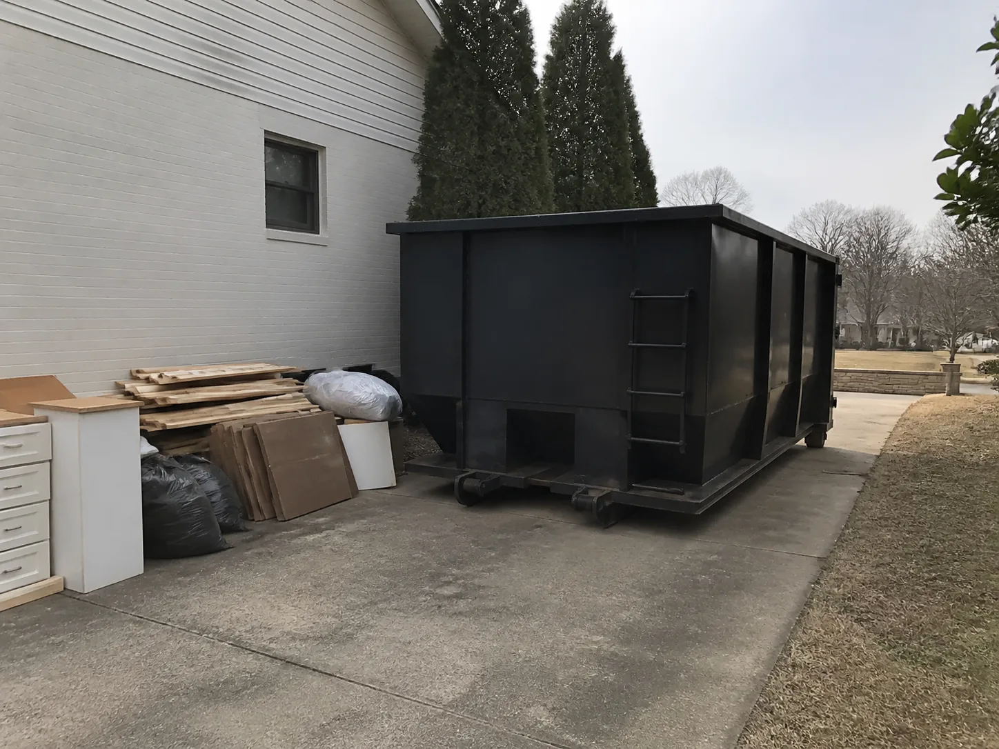 Before — Driveway Dumpster Delivery